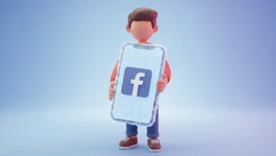 Elinde buzlanmış dev bir akıllı telefon tutan 3D karakter figürü ve ekran üzerindeki Facebook logosu
